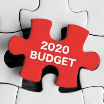 A jigsaw piece with the words "2020 Budget" in front of blank jigsaw pieces